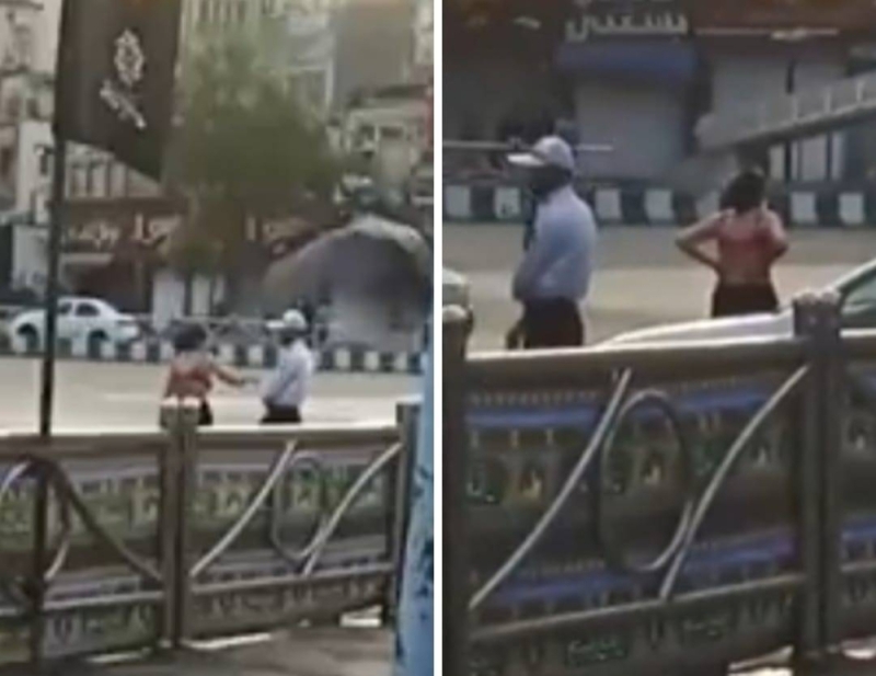 فيديو يثير ضجة لإيرانية تخلع حجابها وتسير بملابس شبه عارية وسط شارع عام !